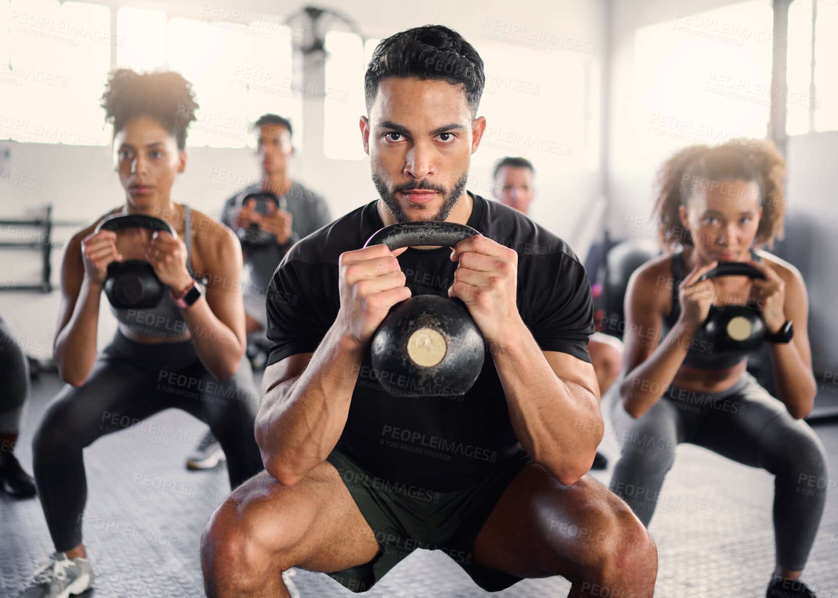 Buy stock photo Kettlebell, workout and fitness class with a gym coach and people training with cardio and exercise. Portrait of a strong personal trainer and sports friends in a wellness health club with motivation