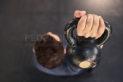 Buy stock photo Fitness, bodybuilding and kettlebell workout by man at a gym from above, training and wellness with mockup. Exercise, bodybuilding and weightlifting by guy in sports center, power and muscle mock up