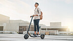 Man on scooter for travel, eco friendly transport and urban with environment and sustainability on commute to work. Young hipster, electric scooter and clean carbon footprint motivation in cityscape.