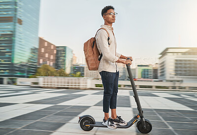 Buy stock photo Travel, scooter and student in city, street or outdoors on road on eco friendly transportation. Technology, sustainability and male from India on electric moped commuting to college or university.
