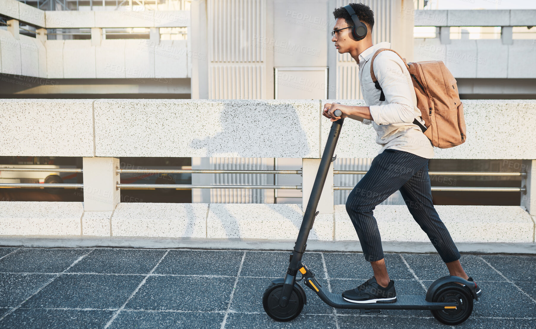 Buy stock photo City, travel and black man with eco scooter for net zero and eco friendly work commute in urban town. Environmental, carbon neutral and worker transportation with music or podcast on electric bike.