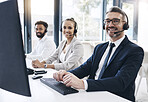 Finance, contact us and financial consultant in a call center with diversity working in customer support. Smile, portrait and happy fintech telemarketing agents talking to clients in customer service