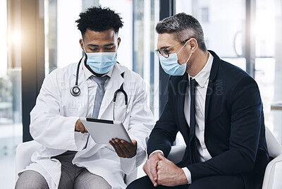 Buy stock photo Covid, tablet and doctor with patient results from corona virus test, hospital medical exam or healthcare report. Black man, medicine expert advice and clinic worker consulting man or treatment plan