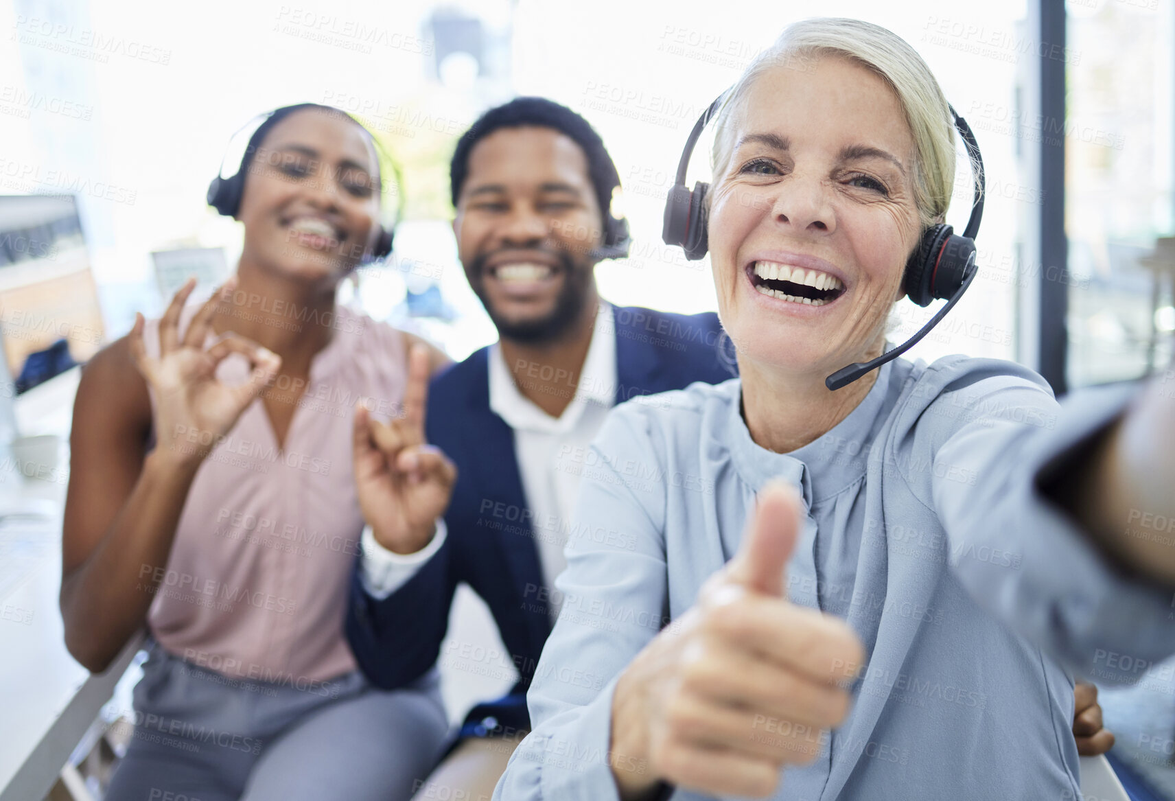 Buy stock photo Call center, group and selfie with smile, hand sign or diversity in workplace for friends together. Happy customer service, crm or photo portrait in office for solidarity, motivation or teamwork