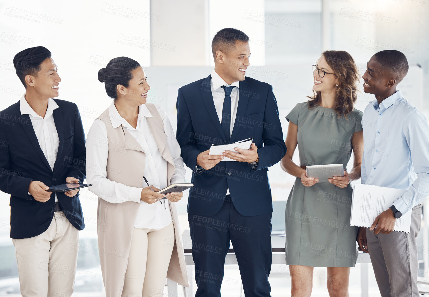 Buy stock photo Team, leadership and business people standing in office talking, having conversation and discussion. Teamwork, diversity and group of employees in workplace with paper, notebook and tablet in hand