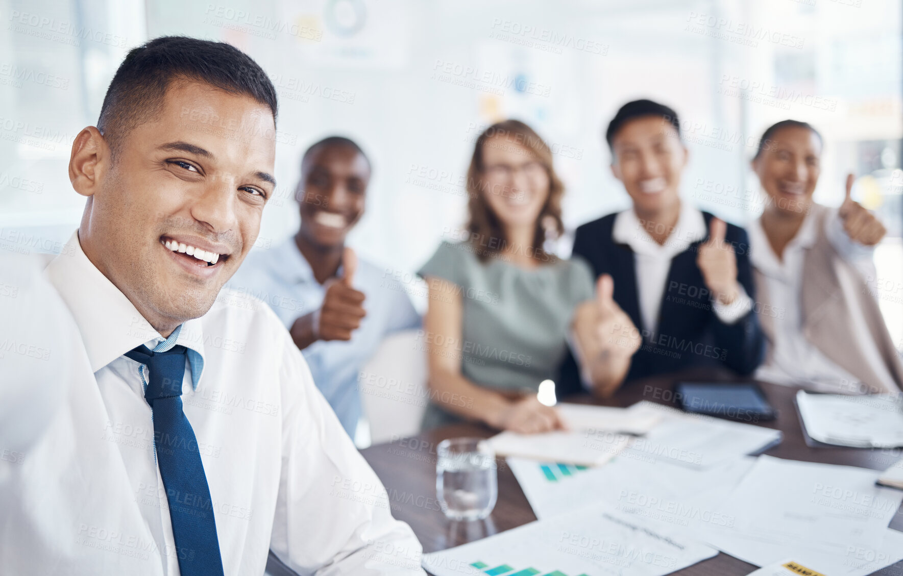 Buy stock photo Teamwork, diversity and selfie of business people in the office with thumbs up for success. Collaboration, workforce and man taking picture after meeting with paperwork, documents and reports on desk