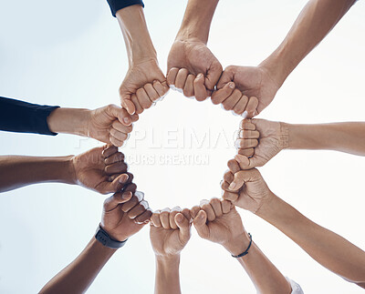 Buy stock photo Hands, trust and support fist circle with low angle for loyalty, mission and friends with cooperation. Connection, hope and community of people together for social commitment, community and trust