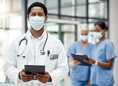 Buy stock photo Covid, healthcare and African doctor with a tablet for online consulting, agenda and planning on tech at hospital. Medical, portrait and surgeon with technology for schedule and face mask at a clinic