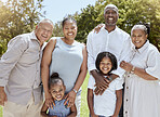 Portrait of happy black family with smile in park, garden or outdoor picnic venue. Men, women and kids together on grass at family event and making memories, generations with girl children and couple