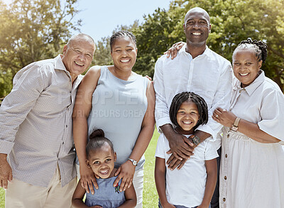 Buy stock photo Portrait of happy black family with smile in park, garden or outdoor picnic venue. Men, women and kids together on grass at family event and making memories, generations with girl children and couple