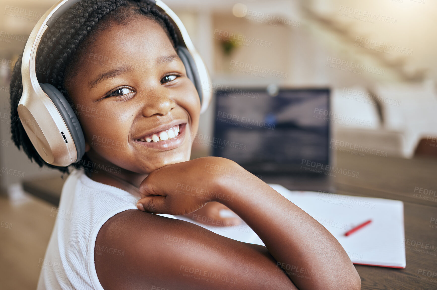 Buy stock photo Education, homework and African girl with music for learning studying and elearning with school books in house. Podcast, happy and portrait of a young child with headphones during study for knowledge