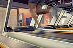 Running, fast and legs of a man on the treadmill for fitness, training and motivation in the gym. Energy, power and runner on equipment at a club for cardio exercise, workout and sports health