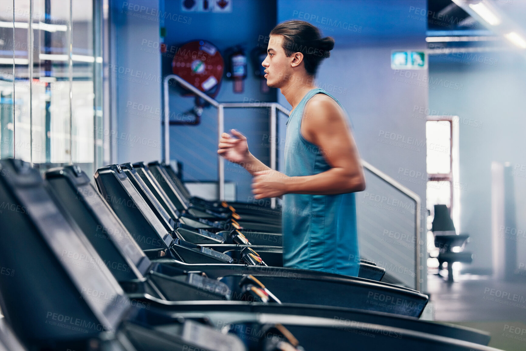 Buy stock photo Treadmill, running and profile of man in gym for cardio workout and heart health. Fitness, sports and male runner on machine practicing for marathon, race or training for wellness in fitness center.