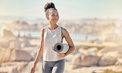 Buy stock photo Beach, yoga mat and black woman with smile outdoor for meditation, wellness and peace to relax. African American female, lady and seaside walking, health or pilates for exercise, calm or seaside view