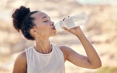 Buy stock photo Fitness, wellness and black woman drinking water after exercise, training and workout in nature, park and outdoors. Hydration, health and thirsty female athlete drink from water bottle after running