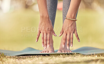 Buy stock photo Hands, yoga and stretching with a sports woman practicing meditation on a field outdoor in summer. Fitness, peace and wellness with a female athlete getting ready for workout, exercise or meditation