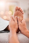 Foot massage, spa and woman client ready for feet healing, therapy and relax treatment. Physiotherapy, health clinic and employee hands working and massaging skin for stress relief and pedicure 