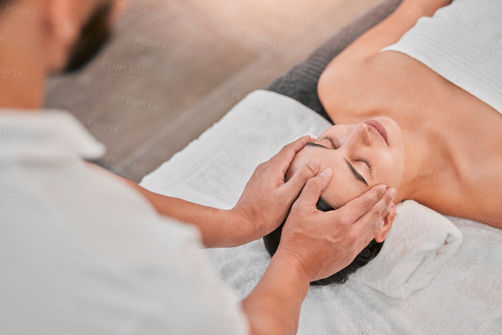 Buy stock photo Spa, face massage and masseuse in a beauty spa with a relaxed woman and massage therapy. Beauty, health and wellness with head massage for stress relief, peace and tranquil treatment 