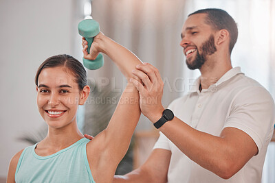 Buy stock photo Health, physiotherapy and wellness exercise rehabilitation with happy woman client lifting dumbbell. Workout, healthcare and physiotherapist helping girl with arm stretching and recovery fitness.