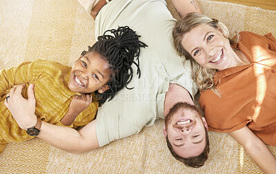 Buy stock photo Happy, family and adoption portrait top view of caucasian mother and dad with black kid in house. Relax, interracial and smile of child together with foster mom and father in joyful home.


