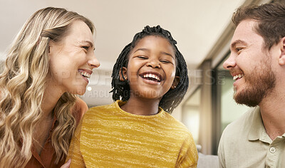 Buy stock photo Family, adoption and parents with girl in home having fun, laughing and bonding together on weekend. Love, multicultural and happy mom and dad with african american daughter relax in living room