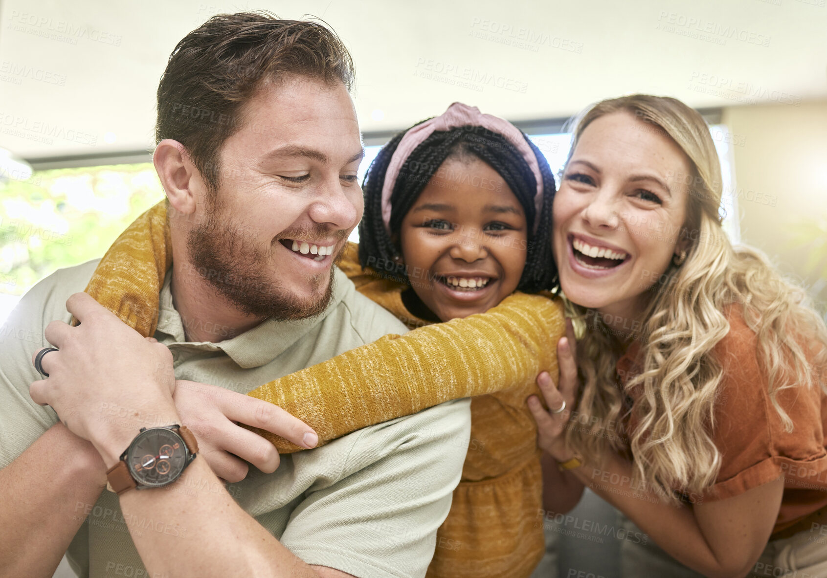Buy stock photo Family, children and adoption with a girl, mother and father bonding in the living room of their home. Portrait, love and smile with happy foster parents and black daughter together in a house