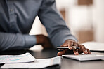 Accountant, financial planning and bookkeeping man using calculator and paperwork to budget, payroll or profit while doing tax audit or report. Hands of a businessman in office for accounting