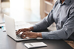 Laptop, hands typing and business man in office working on job email or report. Digital research, developer and programmer writing, programming software or coding app on computer at desk in workplace