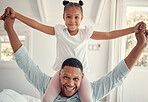Home, love and girl on dad shoulder having fun, playing and bonding together for quality time. Affection, black family and portrait of young child and father in living room on weekend in family home