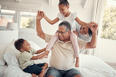 Buy stock photo Family, grandfather and piggy back on bed, having fun and bonding. Support, love and care of grandpa, mom and kids playing, enjoying quality time together and relaxing in house on weekend in bedroom.