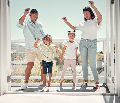 Buy stock photo Happy family dancing, couple and kids on balcony of home having fun in celebration of summer life. Mother, father and children dance together to celebrate weekend in new apartment with happy energy.