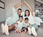 Family, roof and hands together for portrait on floor in bedroom at home, support bonding and quality time. Security, protection and parents with children for love, safety or happiness in family home