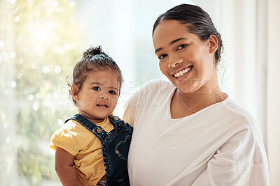 Buy stock photo Love, mother holding girl and portrait being happy, bonding and loving together to relax. Motherhood, mama and daughter have quality time, happiness and carry child with care and a smile