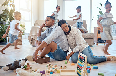 Buy stock photo Tired, family and children running in living room with toys and playing for energy, noise and active. Burnout, headache and stress with mom and dad with fatigue and kids for crazy, adhd and youth