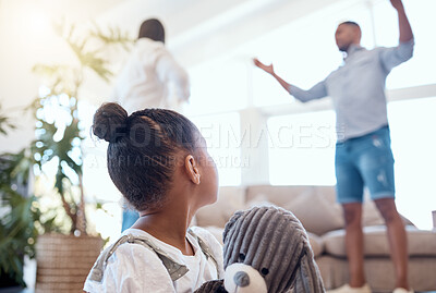 Buy stock photo Argument, divorce and scared child in the living room with a teddy bear for comfort in a modern house. Family, break up and parents fighting with disagreement in front of girl kid in lounge at a home