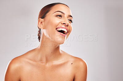Buy stock photo Skincare, face glow or laughing woman on studio background in self love, dermatology wellness or cosmetology success. Smile, happy or Brazilian beauty model and facial makeup cosmetics on gray mockup