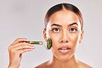 Beauty, skincare and jade roller with portrait of woman for facial massage, self care and spa wellness mockup. Cosmetics, health and dermatology with girl model for cosmetology, youth and luxury