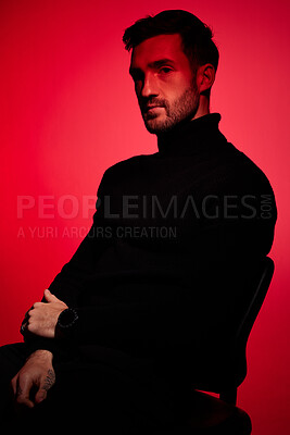 Buy stock photo Red light, fashion model and man with designer clothes, beauty and lifestyle brand. Portrait of a contemporary, creative and edgy clothing with person looking calm, cool and modern with style