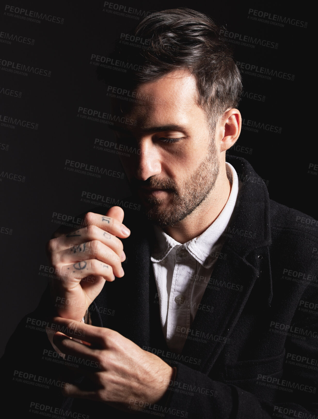 Buy stock photo Fashion, style and man model in studio with confidence in stylish, fancy and fashionable clothes. Handsome, confident and young male in luxury or designer outfit isolated by dark or black background.