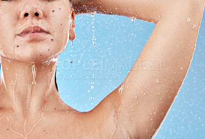 Buy stock photo Shower, water and woman cleaning body for self care treatment, hygiene or daily bathroom routine. Body care, healthcare and wellness girl washing skin for natural skincare isolated on blue background