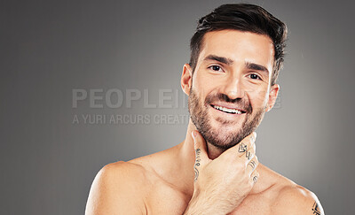 Buy stock photo Skincare, beauty and portrait of man in studio with smile isolated on gray background for body care. Cosmetics, wellness and face of male model pose for grooming, healthy skin and skincare products