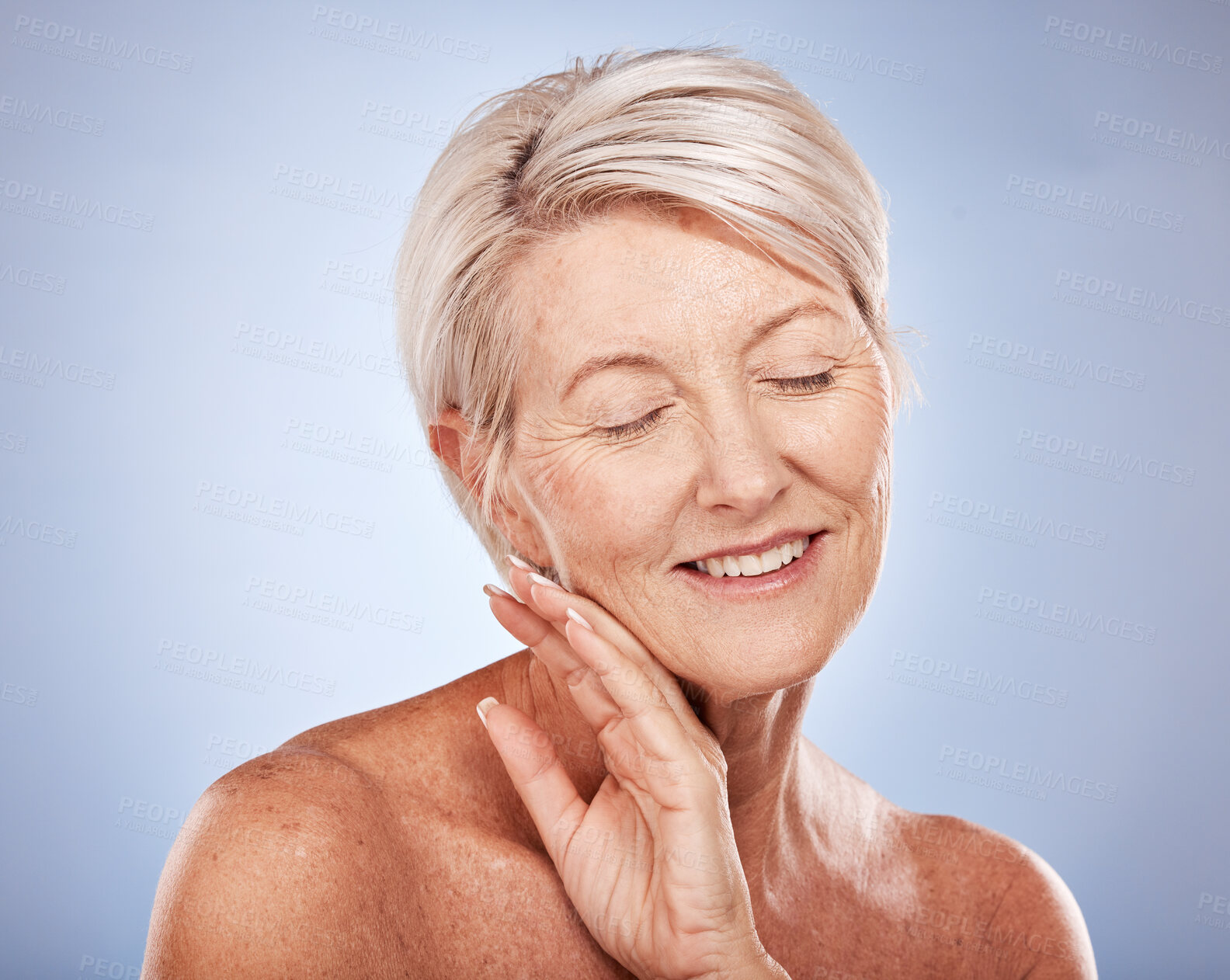Buy stock photo Beauty, skincare and mature woman for happy, health and wellness with smile on a grey studio background. Anti aging, senior female and fresh, glowing and healthy skin care and body care 