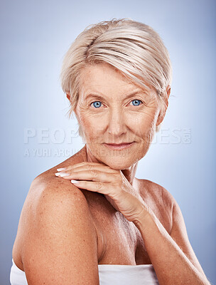 Buy stock photo Face, portrait and skincare with a senior woman in studio on a gray background for wellness or natural care. Beauty, antiaging and luxury with a mature female posing to promote skin or bodycare