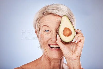Buy stock photo Skincare, avocado and senior woman with smile, natural beauty and confident against grey studio background. Cosmetics, mature female and elderly lady with avo for facial oils for wellness and health