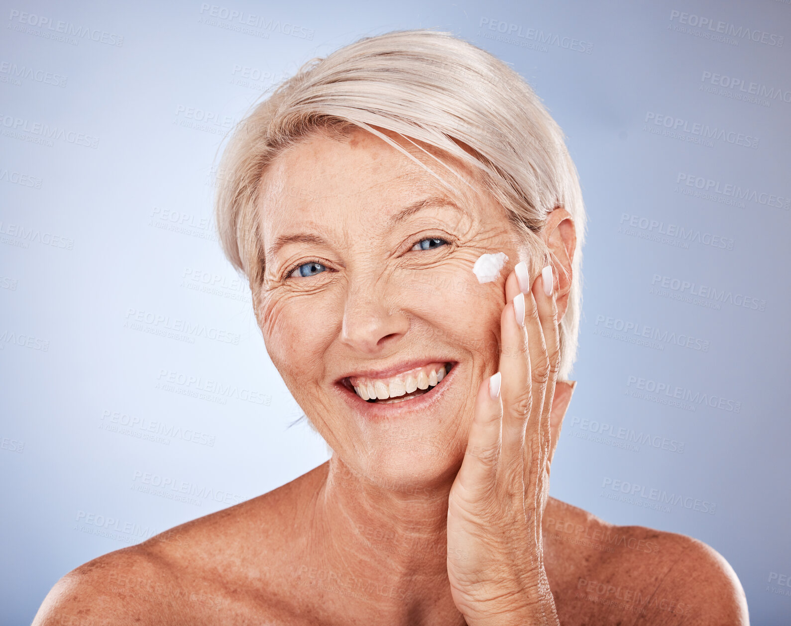 Buy stock photo Skincare, smile and senior woman with cream on face, anti aging moisturizer treatment for wrinkles. Health, wellness and relax portrait of happy mature lady for skin care facial and healthy lifestyle