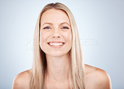 Buy stock photo Hair care, cosmetics and portrait of a woman with a smile against a grey studio background. Skincare, wellness and face of a happy model with straight hair from the hairdresser with clean shine