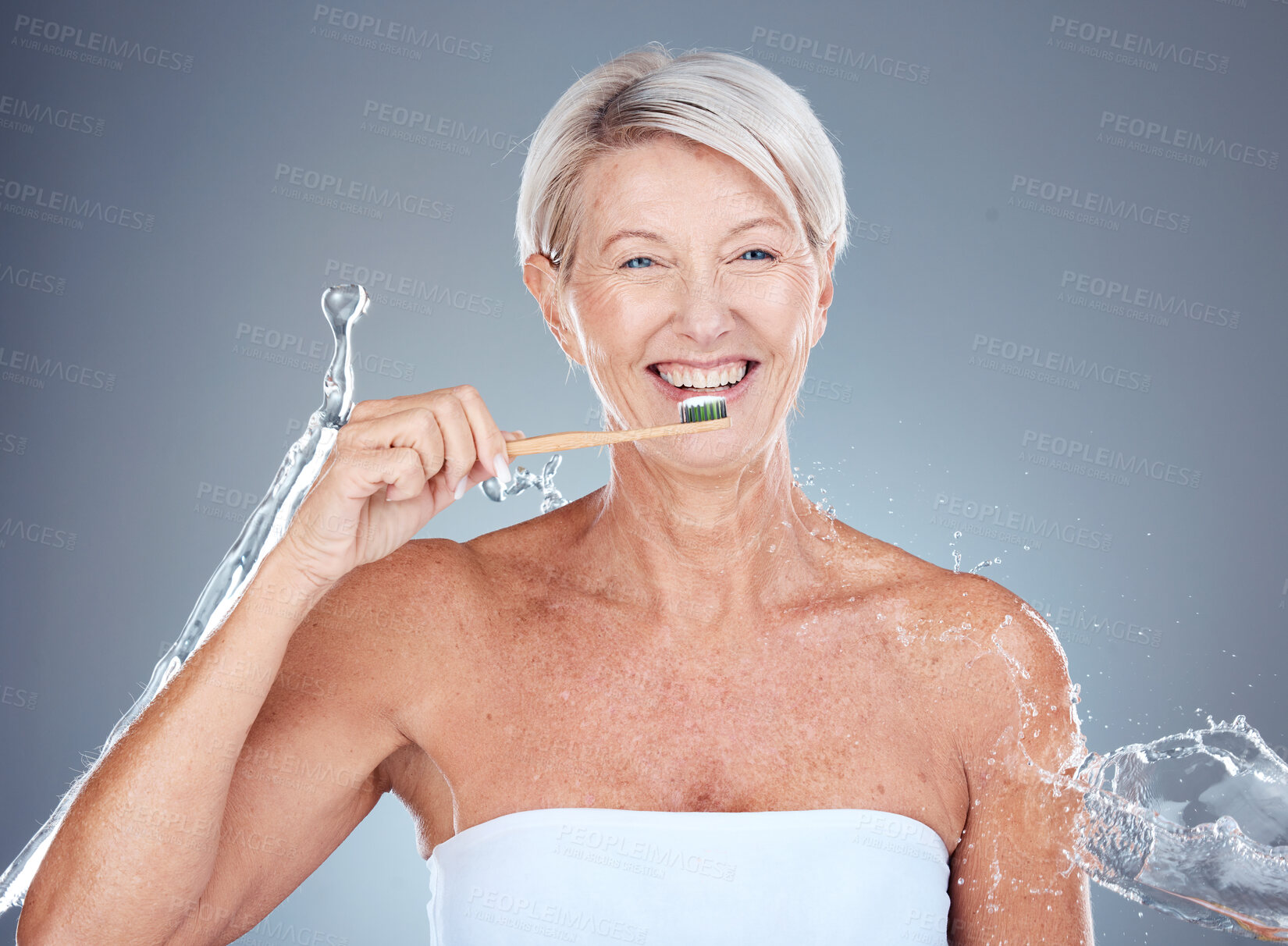 Buy stock photo Toothbrush, portrait and senior woman dental healthcare studio mockup brushing teeth for dentist and whitening advertising. Smile of elderly model mouth with breath fresh toothpaste and water splash