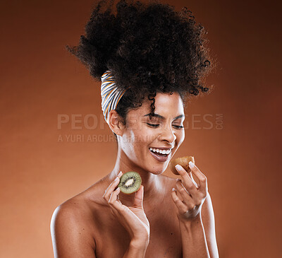 Buy stock photo Kiwi, black woman and beauty for healthy lifestyle, natural cosmetics and skincare product on studio background. Happy african model, organic fruit and vitamins nutrition, vegan diet and detox snack 