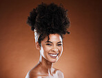 Black woman, afro hair and cosmetic studio with smile on face for self care, hair care and beauty. Woman, cosmetics model with natural african hairstyle, makeup and wellness by brown background