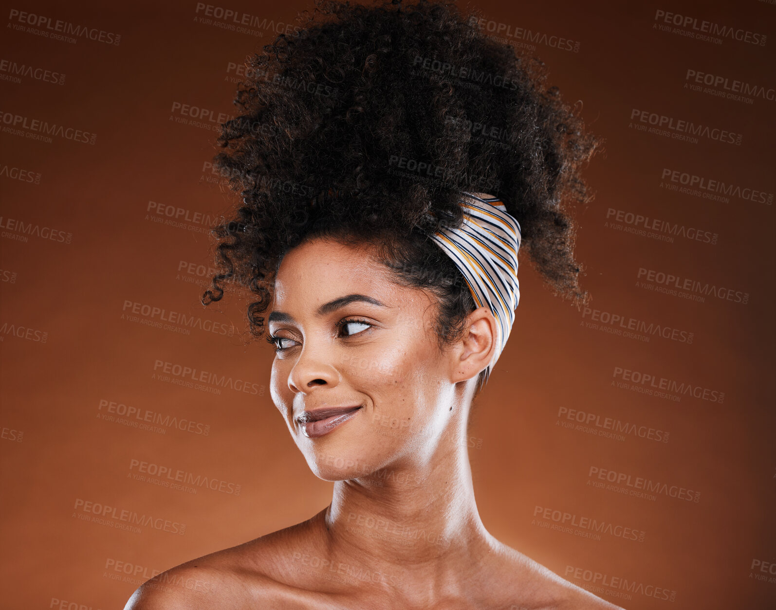 Buy stock photo Beauty, skincare and haircare with a model black woman in studio on a brown background thinking about treatment. Cosmetics, afro hair and idea with an attractive young female with natural skin